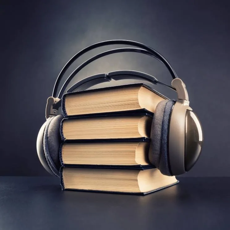 Listener with headphones in a cozy setting